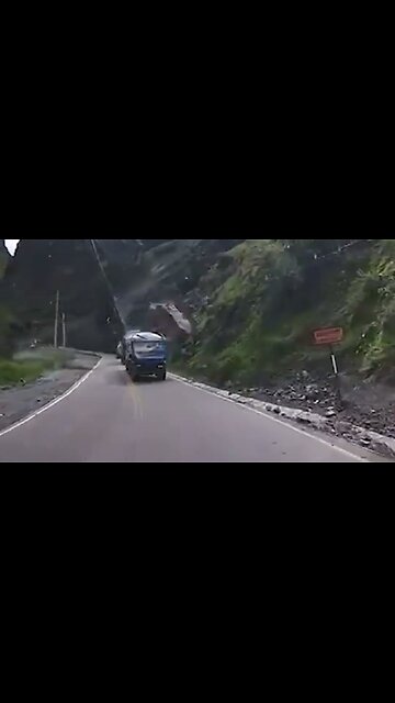 Insane Footage Shows Giant Bolders Destroying Two Trucks In Peru