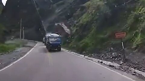 Insane Footage Shows Giant Bolders Destroying Two Trucks In Peru
