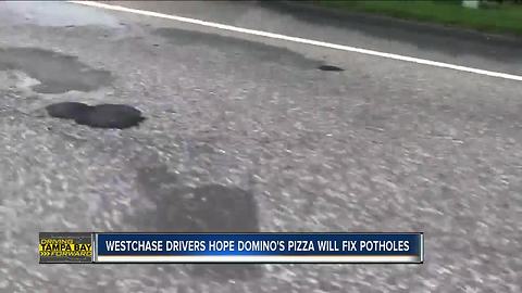 Westchase residents impatient with pothole fixes turn to Domino's Pizza for help