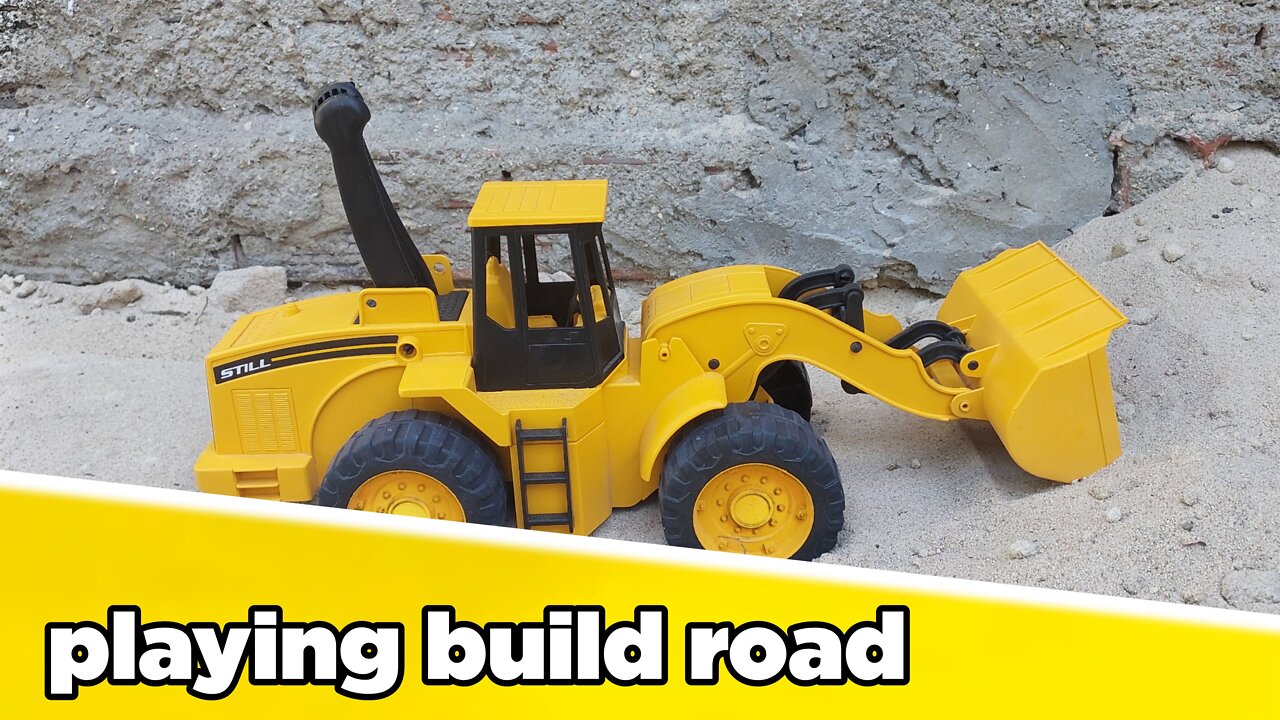 Playing build road, Toy tractor