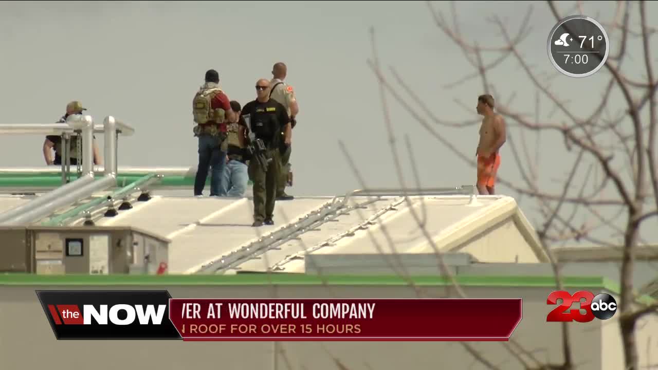 Man on roof of Wonderful Company building identified and in custody