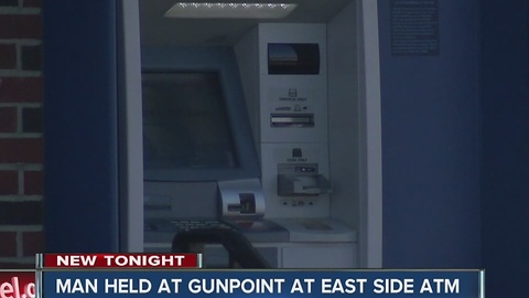 Man held at gunpoint at east side ATM