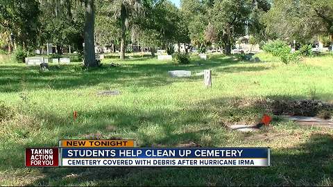 Students help clean up cemetery