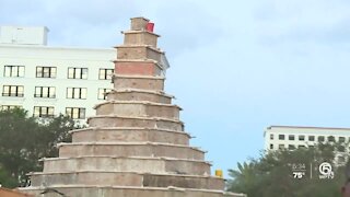 Sculptors begin carving 35-foot tall Christmas tree from sand