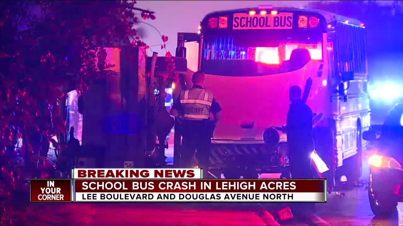 Crews cleaning up scene of crash between school bus and a utility truck in Lehigh Acres