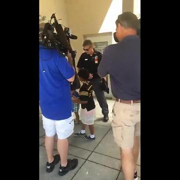 7-year-old hugs police