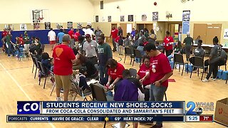 Students receive new shoes, socks in West Baltimore