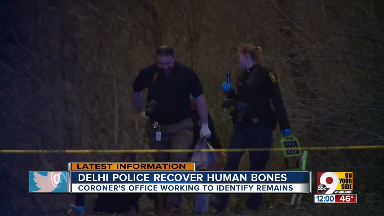 Crews search woods in Delhi Township for more human remains