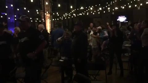 Fans celebrate the Brewers walk-off at the WTMJ Watch Party at Turner Hall