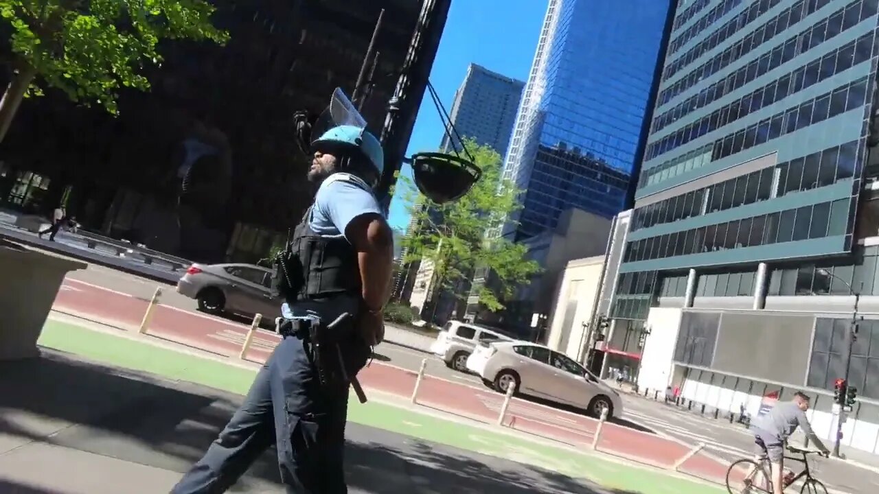 Woman Talks About Police Militarization, J.F.K., Malcolm X Hours Before Chicago Riot (5-30-20)