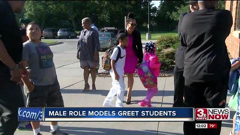 Male role models greet students