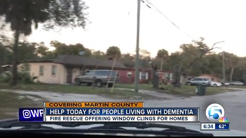 First responders handing out stickers for homes with dementia patients