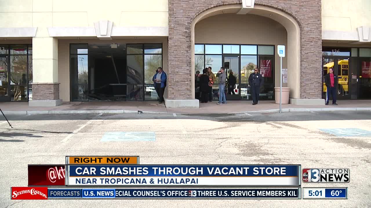 Car drives into store near Tropicana, Hualapai