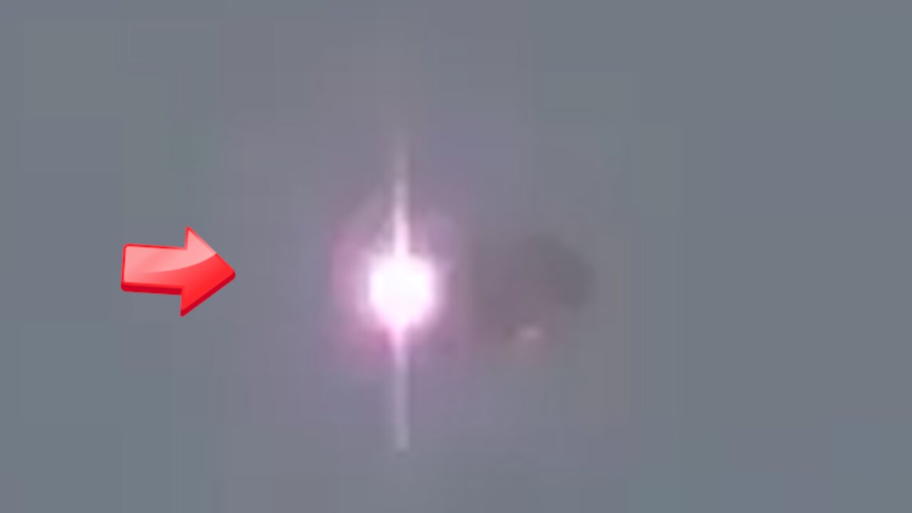 Saucer-shaped UFO signaling something with light over a residential area [Space]