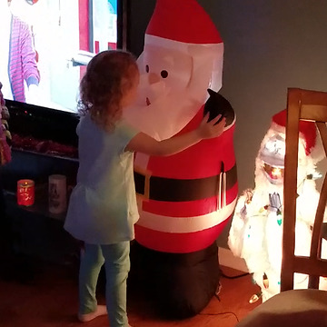 Santa Claus Gets The Unexpected Kisses