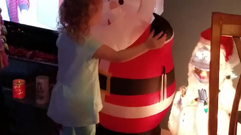 Santa Claus Gets The Unexpected Kisses