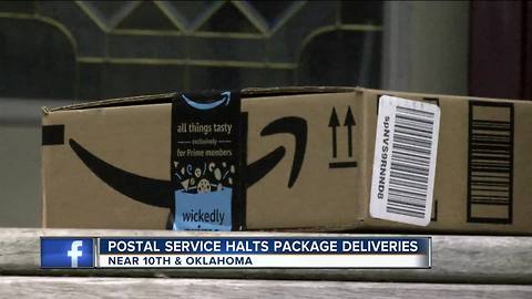 USPS indefinitely stops package deliveries in south side neighborhood