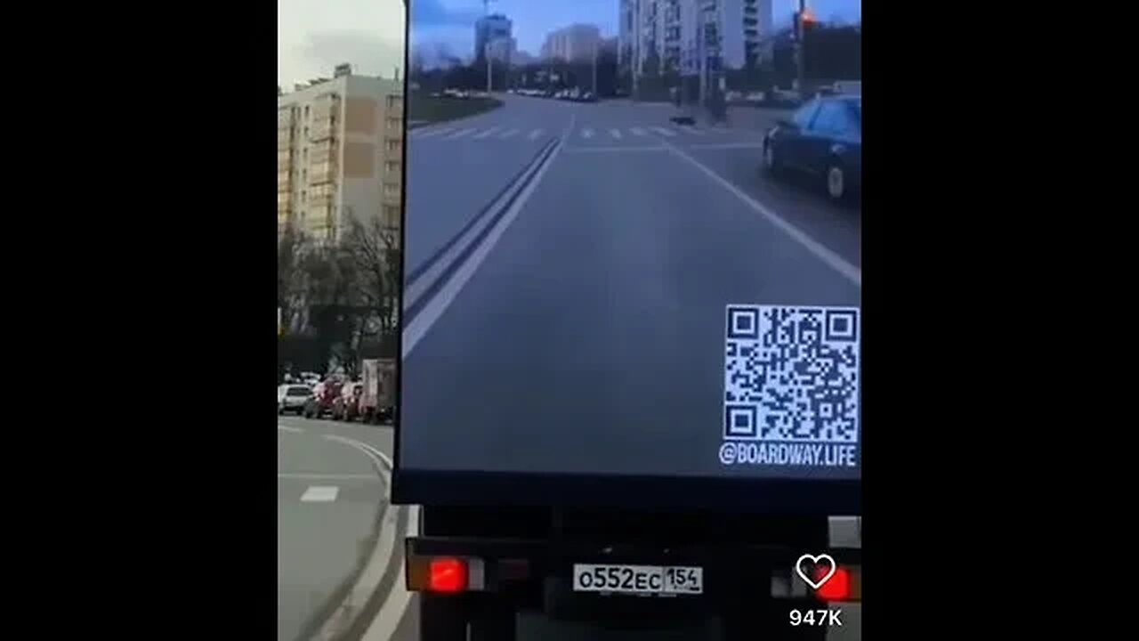 This truck displays its view on the back to help drivers.