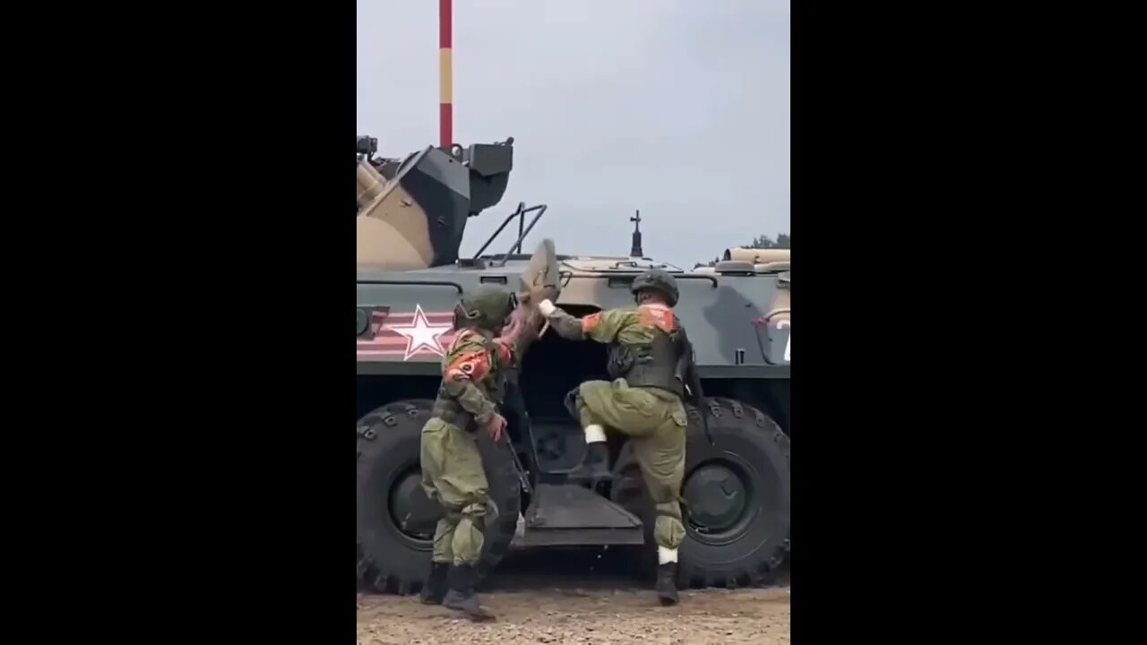 soldiers running to enter moving tanker