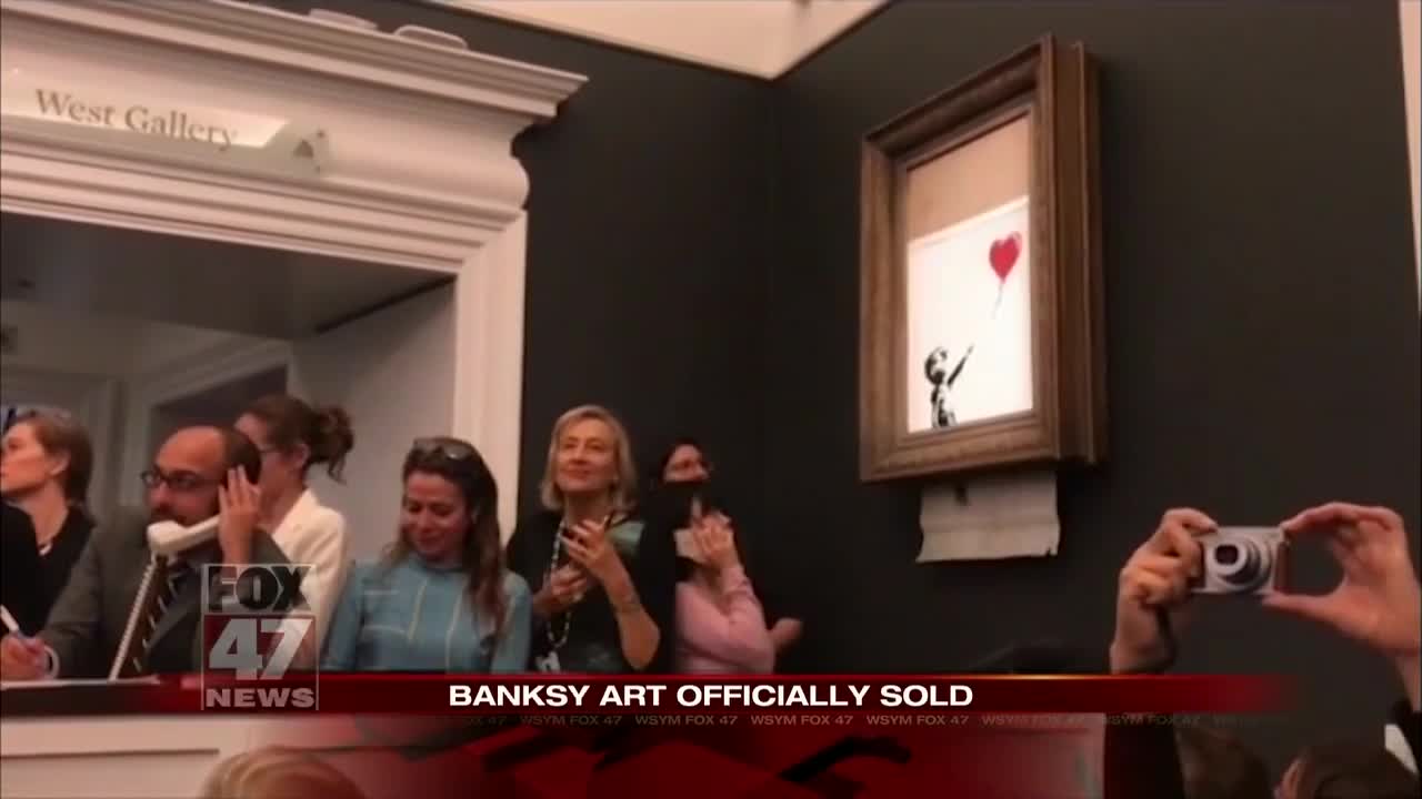 Banksy artwork self-destructs moment after $1.4M sale