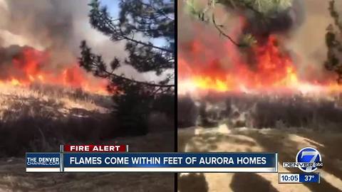 Grass fire burns Tuesday afternoon near Aurora homes