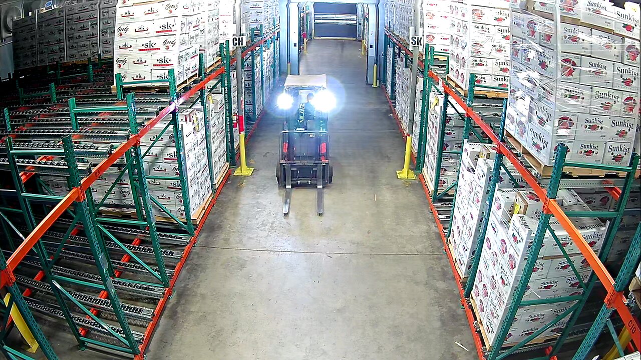 forklift driver takes out the security camera