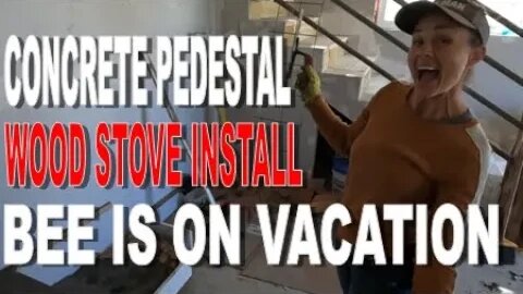 Concrete pedestal, wood stove installation.
