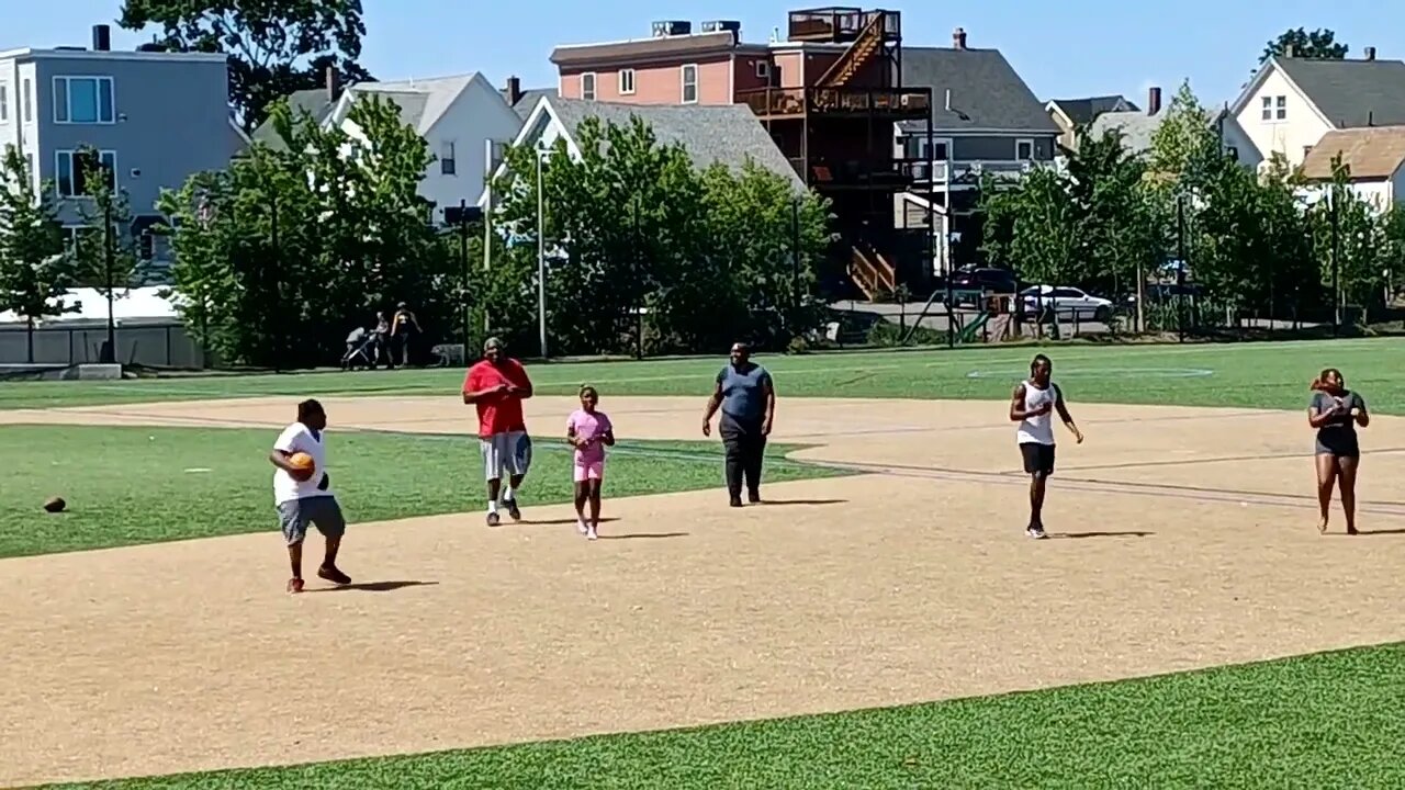 family having a water fight