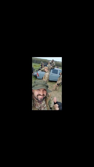 A Ssangyong Actyon Sports pickup truck with a 12.7 mm Browning M2 machine gun, received as military aid from the United States