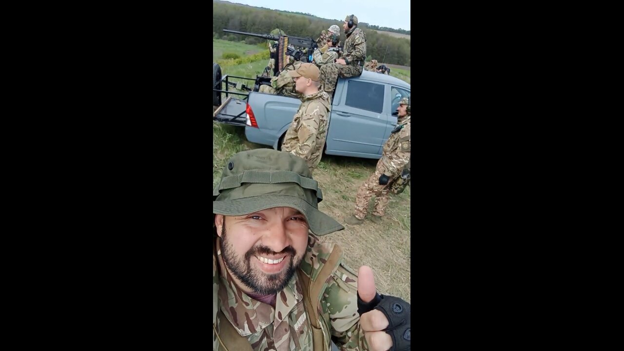 A Ssangyong Actyon Sports pickup truck with a 12.7 mm Browning M2 machine gun, received as military aid from the United States