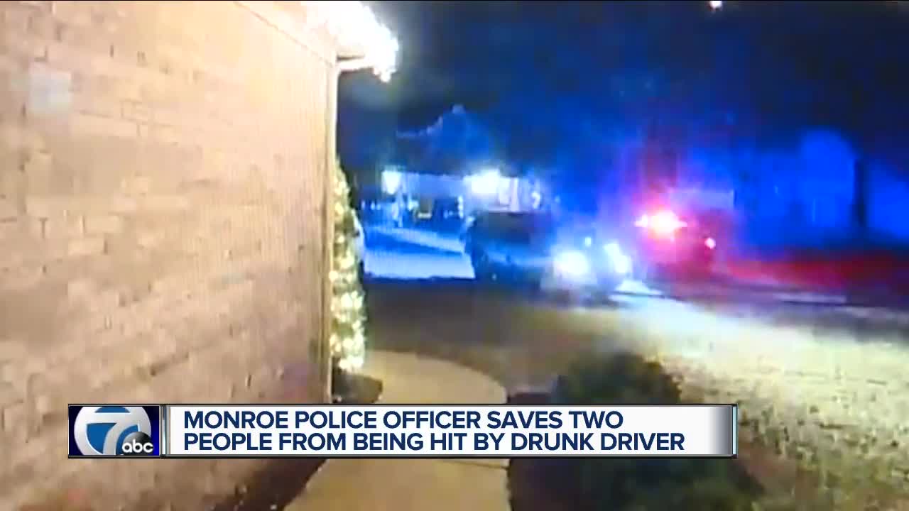 Monroe officer moves civilians out of the way of suspected drunk driver