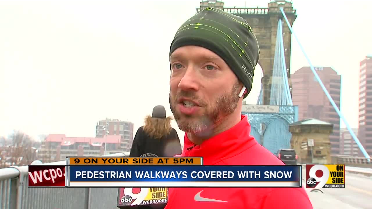 Commuters walking across bridges are stuck with ice and snow