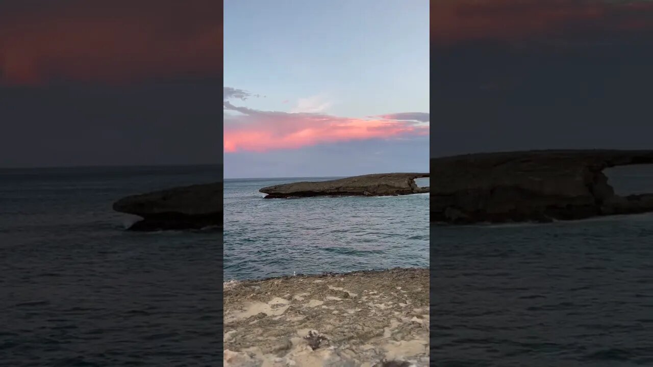 Sunset above Kukuihoolua Island at Laie point wayside park, strong wind & ocean waves natural sounds