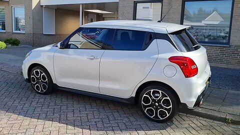 All new Suzuki Swift Sport Hybrid ZC33S sitting on the driveway after pickup at dealer