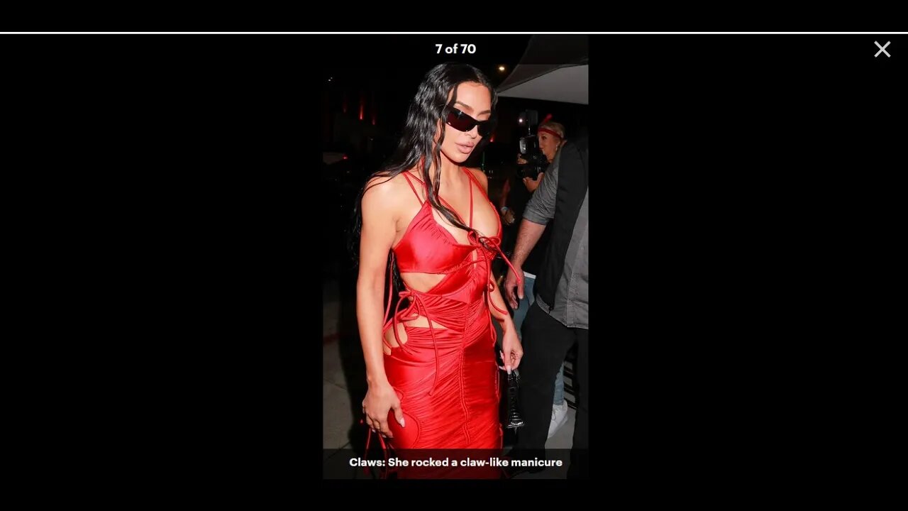 Kim Kardashian is RAVISHING in a s*xy red cutout dress as she parties it up with Khloe, Kendall,