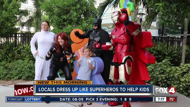 Local superheroes surprise sick kids in Fort Myers