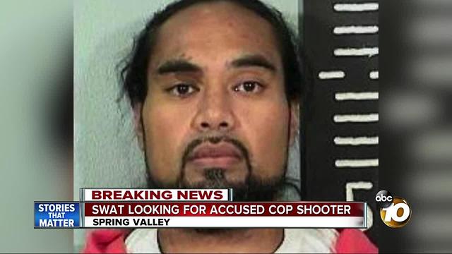 SWAT looking for accused cop shooter