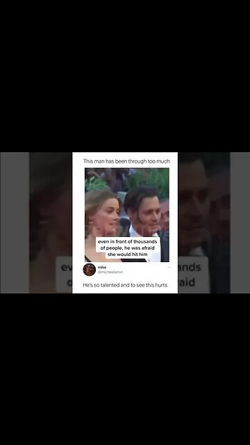 Johnny Depp Flinches at Amber Heard