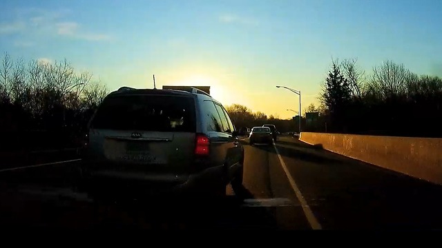 Dashcam captures near collision with school van full of kids