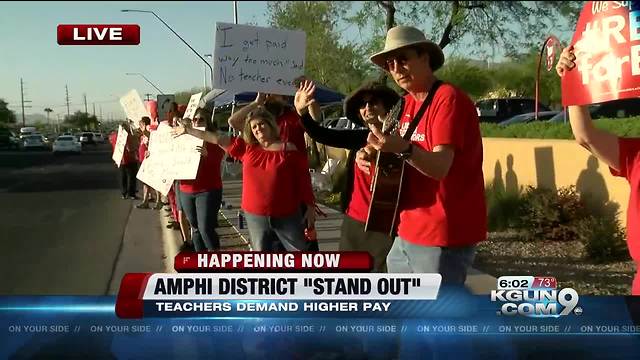 Supporters gather at major intersections along a 17-mile stretch of Oracle Rd., from Coronado K-8 to Nash Elementary in support of #RedforEd