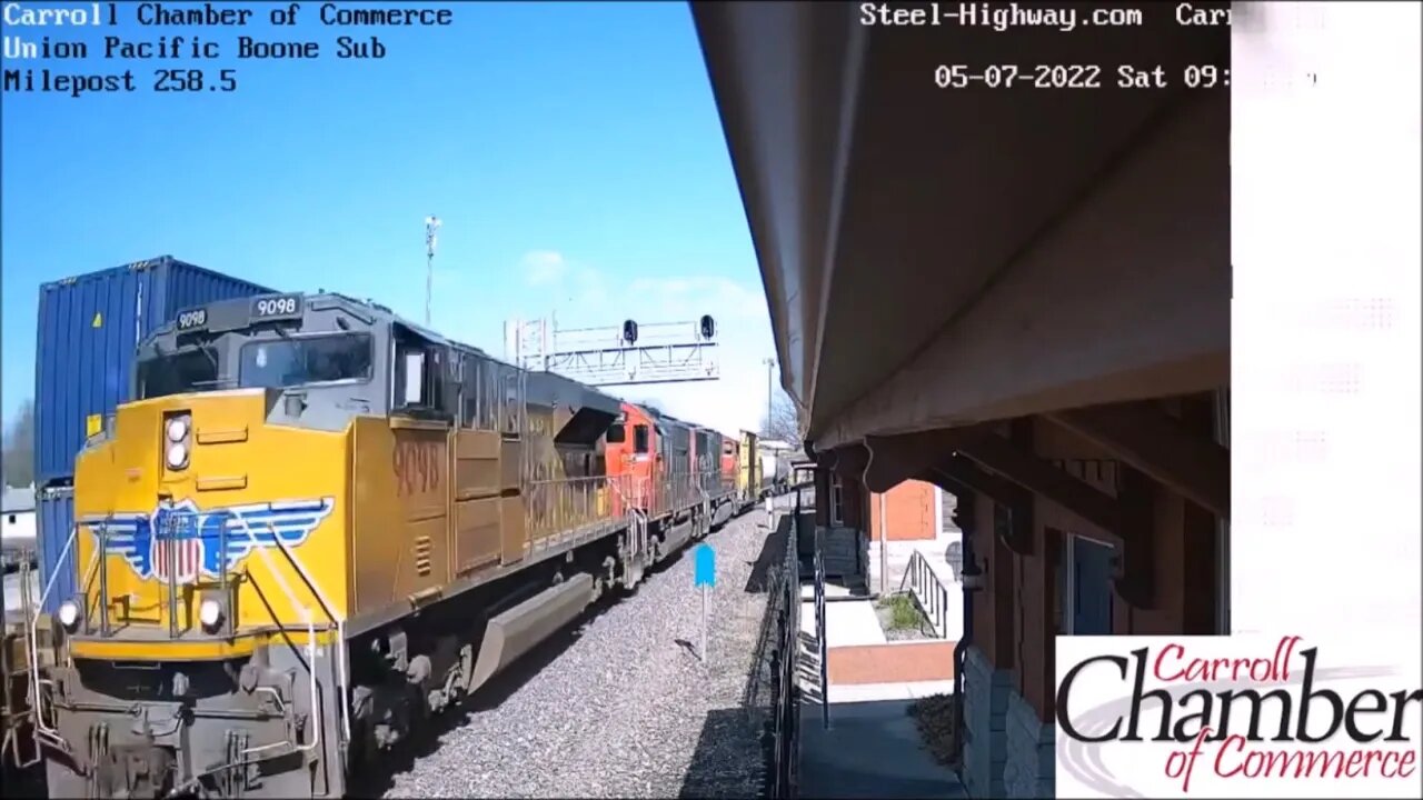 WB Intermodel and EB UP Manifest with IC 1002 and CN 5750 at Carroll, IA on May 7, 2022