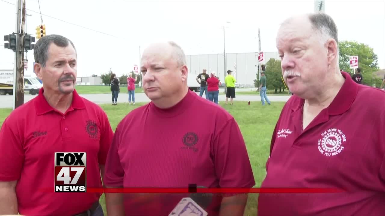 Union members walking the picket line at GM plant in Delta Township