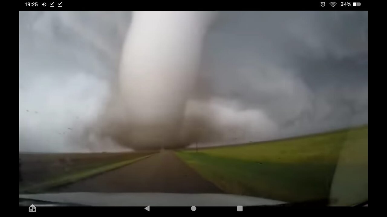 car following huge tornado