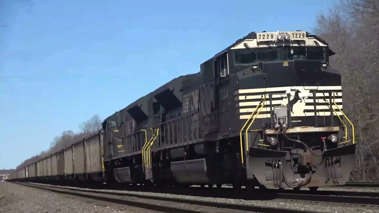 A mixed manifest and a long heavy coal train.