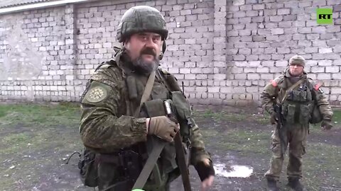 LPR soldiers show captured NATO missile systems and RPGs