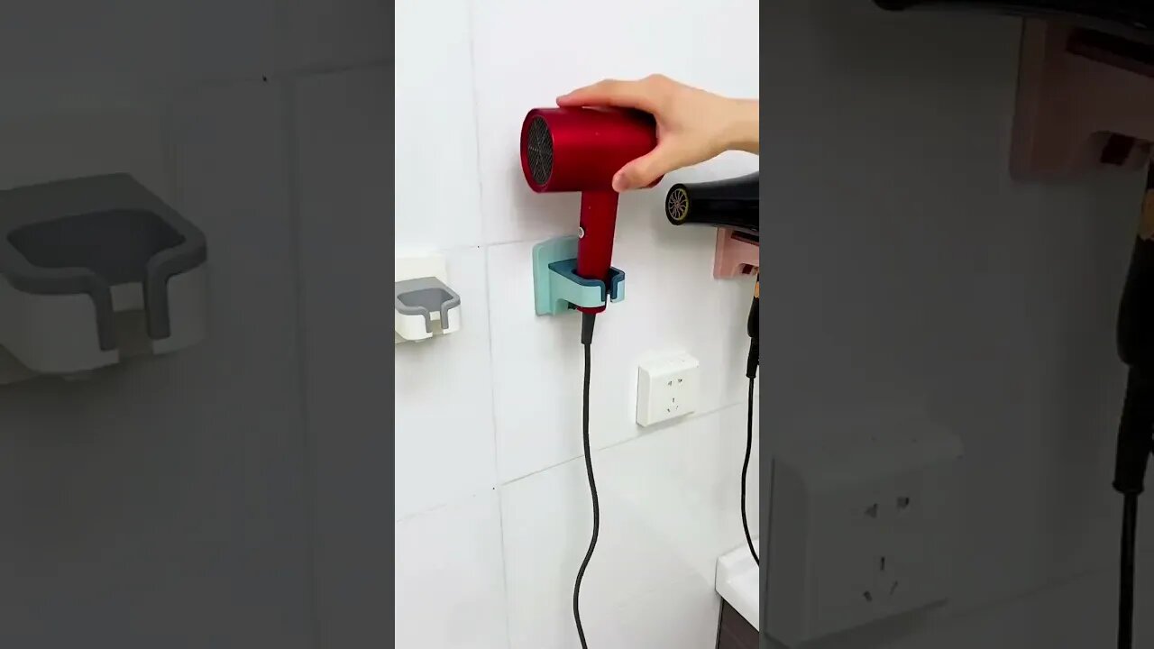 ⭐Product Link in Comments/Bio⭐ Upgrade your bathroom with our sleek Hair Dryer Holder Stand!