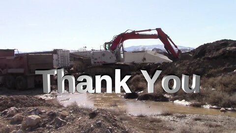 A Peterbilt Dump Truck With A Linkbelt And Yanmar Excavator Working On Roads