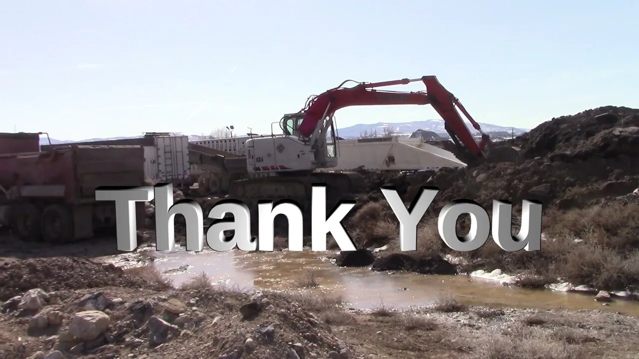 A Peterbilt Dump Truck With A Linkbelt And Yanmar Excavator Working On Roads