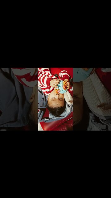 5 months old baby eating toys at the airport