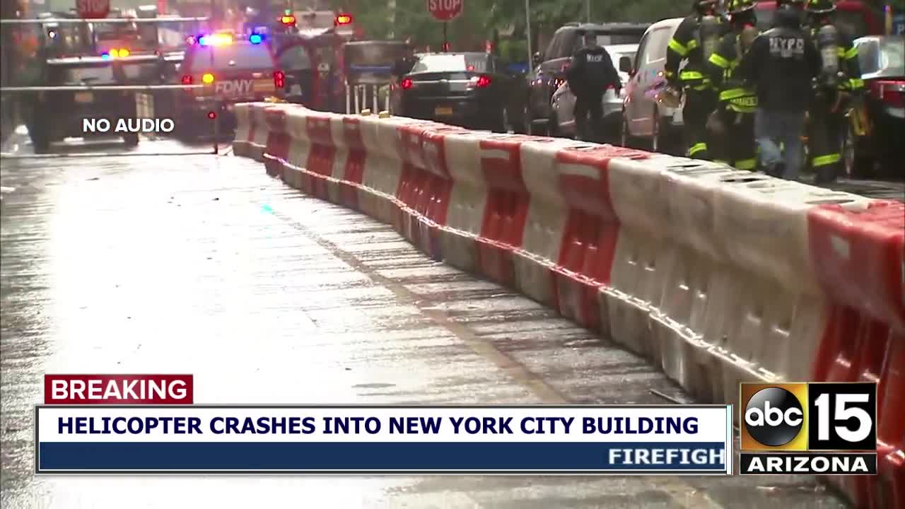 Helicopter crash lands on top of New York city building